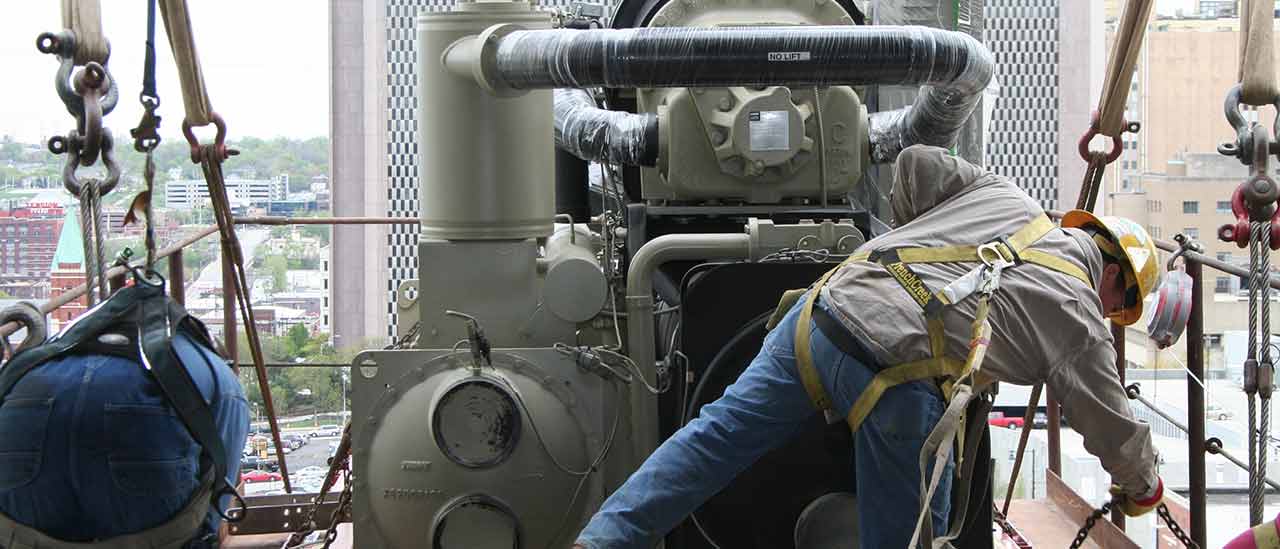 Metro-condos-removing-new-chiller-from-crane-banner-2